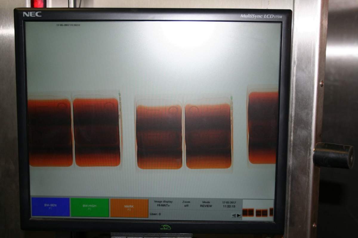 A photo provided by the CBSA shows inconsistencies in liquids contained in jugs of “dishwashing liquid” that was later found to be a precursor drug for ecstasy and MDMA.