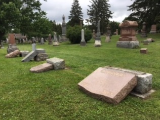 Investigation underway after vandals topple 25 monuments inside St. Thomas cemetery - image