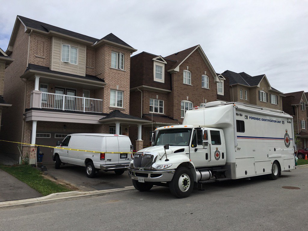 Durham Regional Police forensics unit on scene of a home in Pickering after a woman's body was discovered by officers on Thursday.
