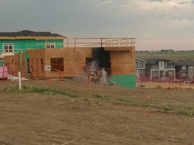 Police investigate after three bodies were found inside a burning vehicle in the 100 block of Sage Bluff Circle N.W. on Monday, July 10, 2017.