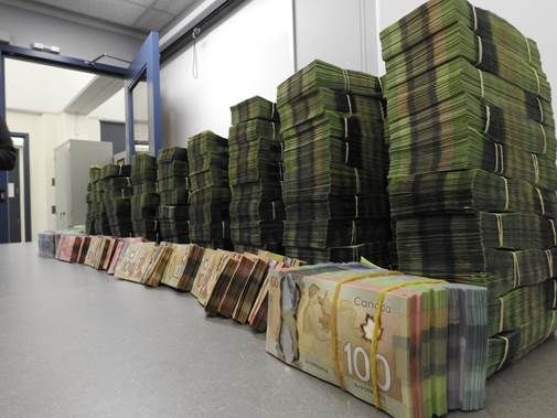 Edmonton police show more than $1 million that was seized in a drug investigation, Friday, July 28, 2017. 