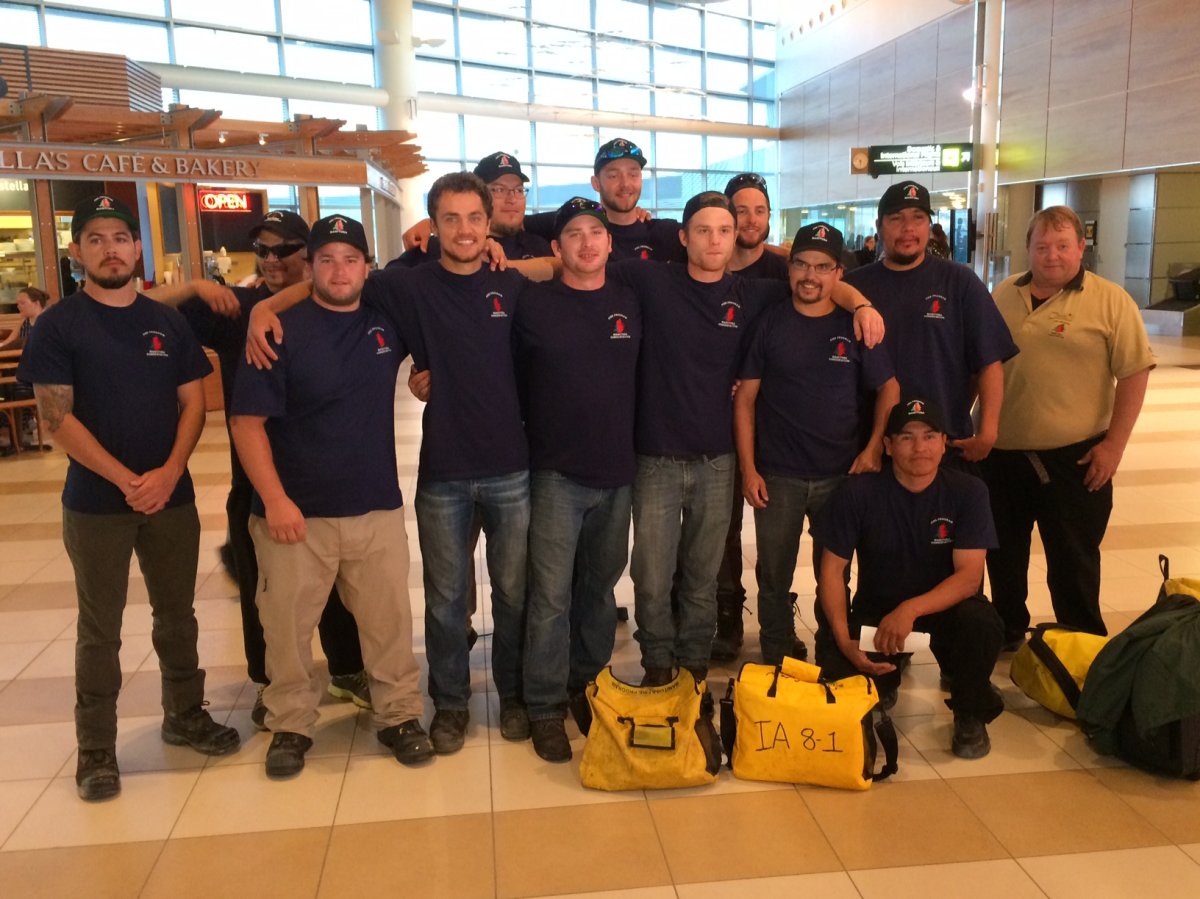 A group of Manitoba firefighters before boarding a plane to British Columbia.