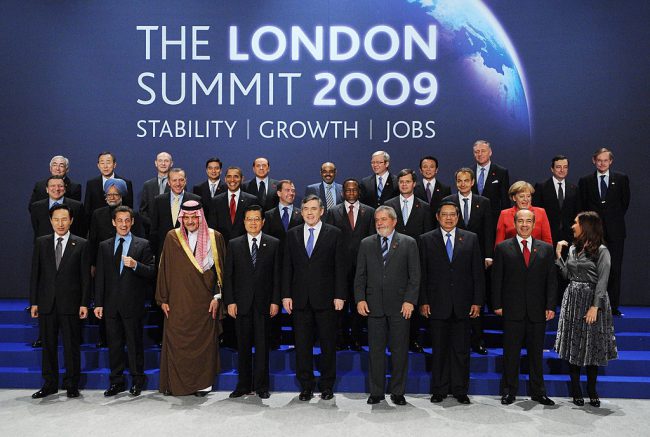 G20 leaders pose for a photo as German Chancellor Angela Merkel and Argentine President Cristina Fernandez de Kirschner appear to be pointing out Canadian Prime Minister Stephen Harper’s absence, London, U.K., April 2, 2009.