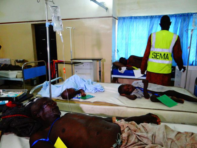 Injured people are treated at the State Specialist Hospital in Maiduguri, northeastern Nigeria on July 29, 2017 the day after two suicide bombers struck a camp for displaced people in Dikwa, 90 kilometres (56 miles) east of Maiduguri, killing five.