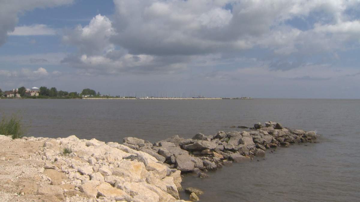Gimli Beach on Lake Winnipeg is pictured above in July 2017. Blue-green algae and Zebra mussels are a growing problem for the province's inland ocean.