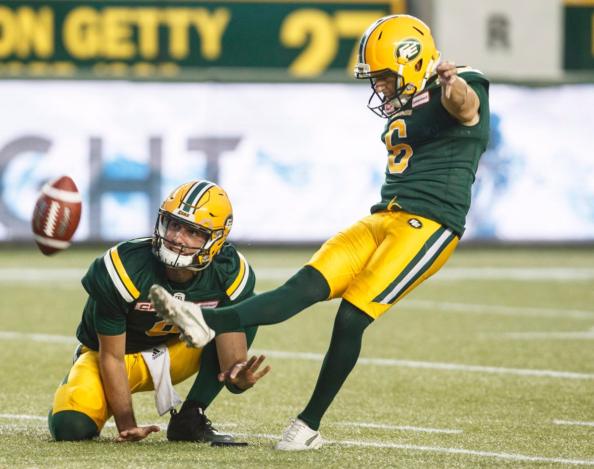 Edmonton Eskimos' Sean Whyte (6) makes the field goal as Danny O'Brien (9) places the ball, against the Ottawa Redblacks during second half CFL action in Edmonton, Alta., on Friday July 14, 2017. 