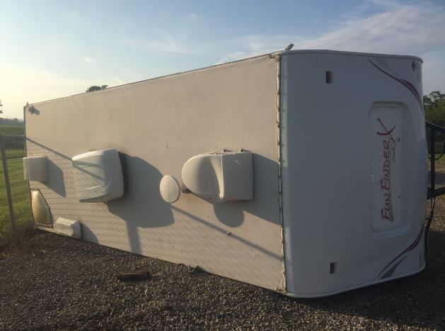 Trailers were found on their sides and upside down following a possible tornado in Lucan.