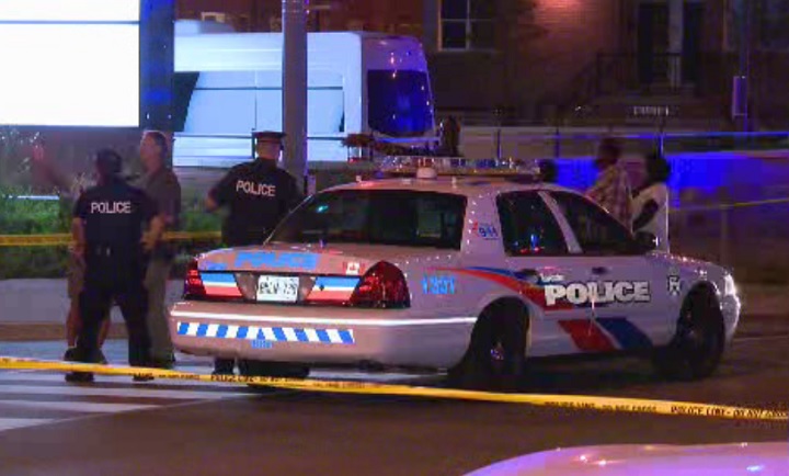 Police investigate a shooting at Dufferin and Lawrence on July 31, 2017.