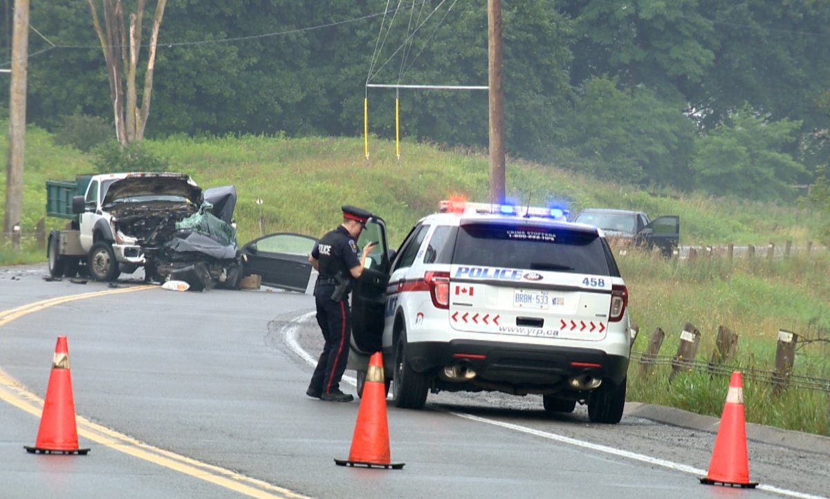 Police investigate a two-vehicle crash in Kleinburg, Ont., on July 27, 2017.