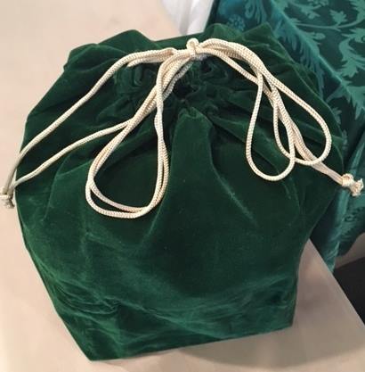 The ashes of 90-year-old Strathcona County woman Mary Myers were a wood box inside this green bag when they were stolen.