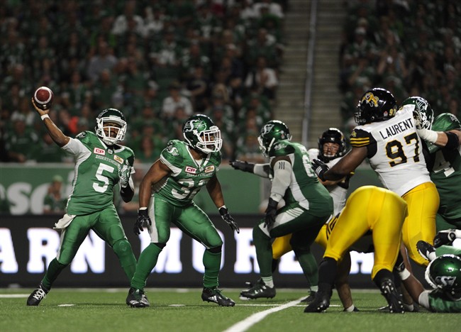 Saskatchewan Roughriders quarterback Kevin Glenn (5) attempts a pass during second half CFL football action against the Hamilton Tiger-Cats in Regina on Saturday, July 8, 2017. 
