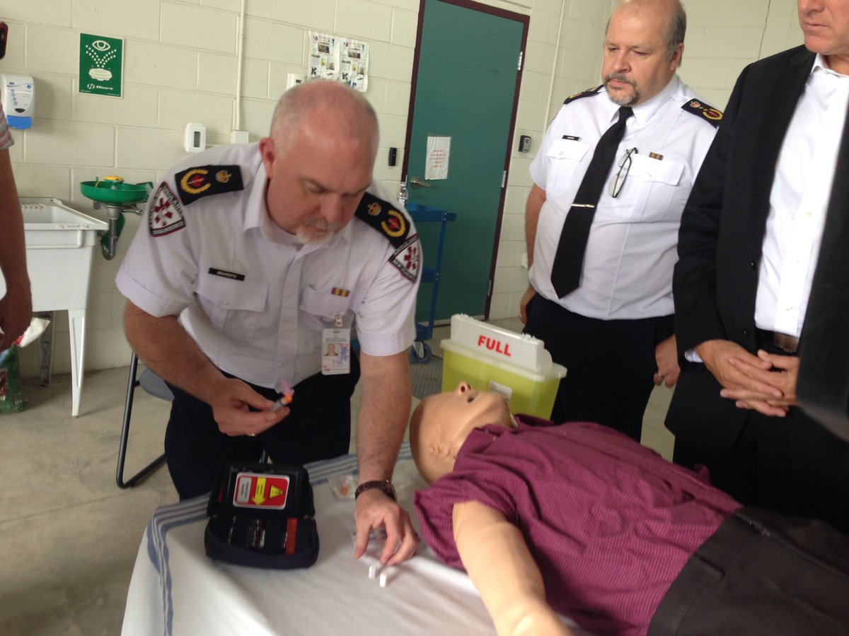 Members of Ambulance New Brunswick provide a demonstration on how the life-saving drug Naloxone is used in cases of opioid overdoses.