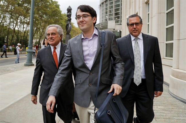 In this Thursday, July 27, 2017, file photo, former biotech CEO Martin Shkreli, center, leaves federal court with his attorney Benjamin Brafman, left, in New York.
