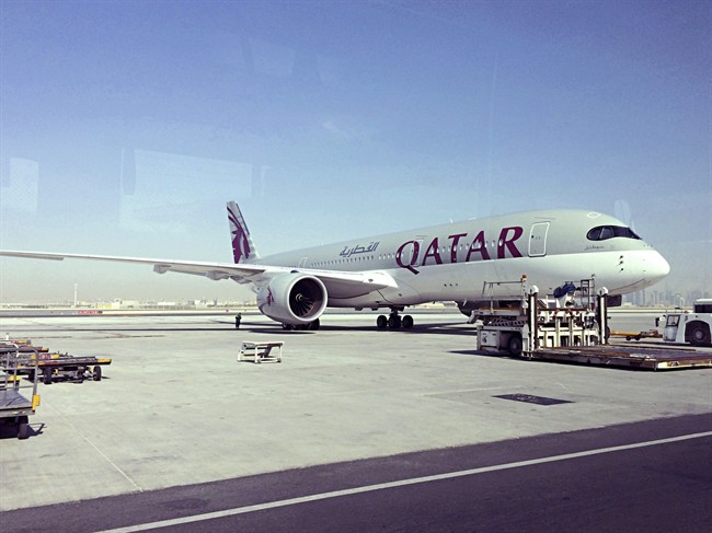 This June 6, 2017, file photo shows a parked Qatari plane in Hamad International Airport in Doha, Qatar. 