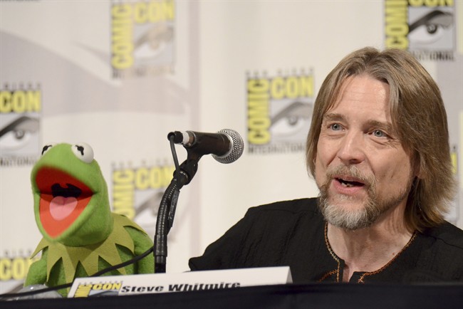 In this July 11, 2015, file photo, Kermit the Frog, left, and puppeteer Steve Whitmire attend "The Muppets" panel on day 3 of Comic-Con International in San Diego.