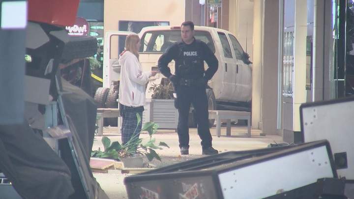 RCMP on the scene after a suspect smashed his flatbed truck into a Prince George mall on July 4, 2017.