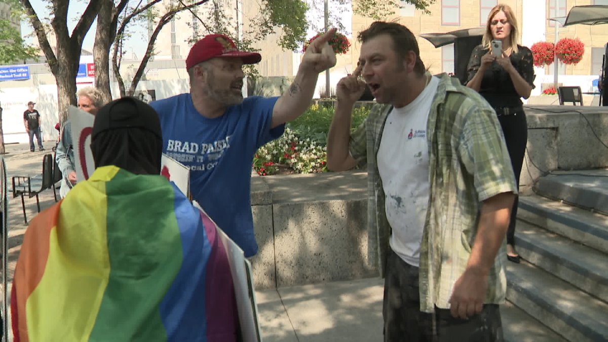 Violence erupts between two groups rallying at Calgary’s city hall Sunday - image