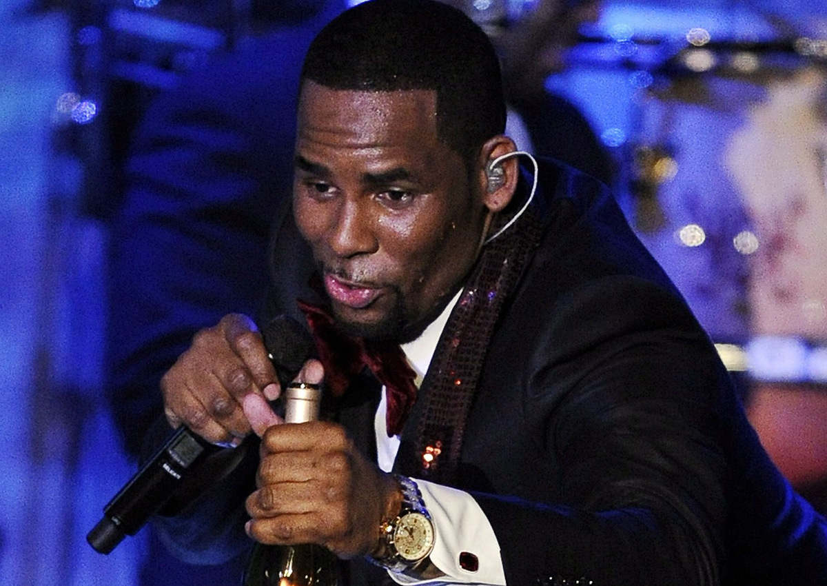 In this Feb. 12, 2011 photo, R. Kelly performs at the pre-Grammy gala & salute in Beverly Hills, Calif.
