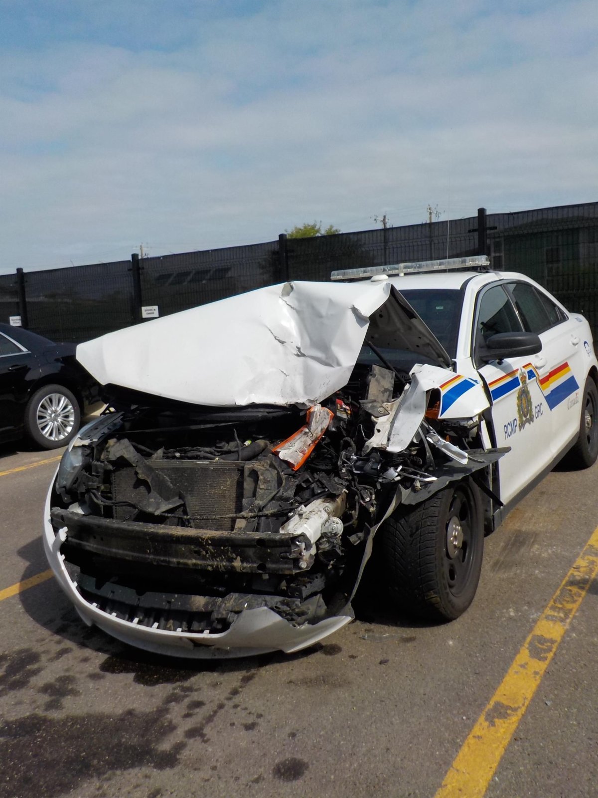 A Red Deer RCMP vehicle is damaged by a stolen truck, Monday, July 17, 2017. 