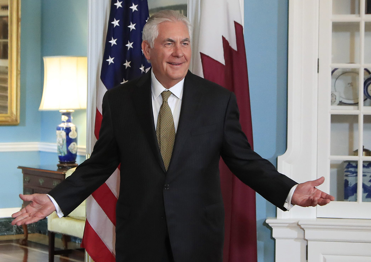 Secretary of State Rex Tillerson gestures as he responds to a reporter's question.