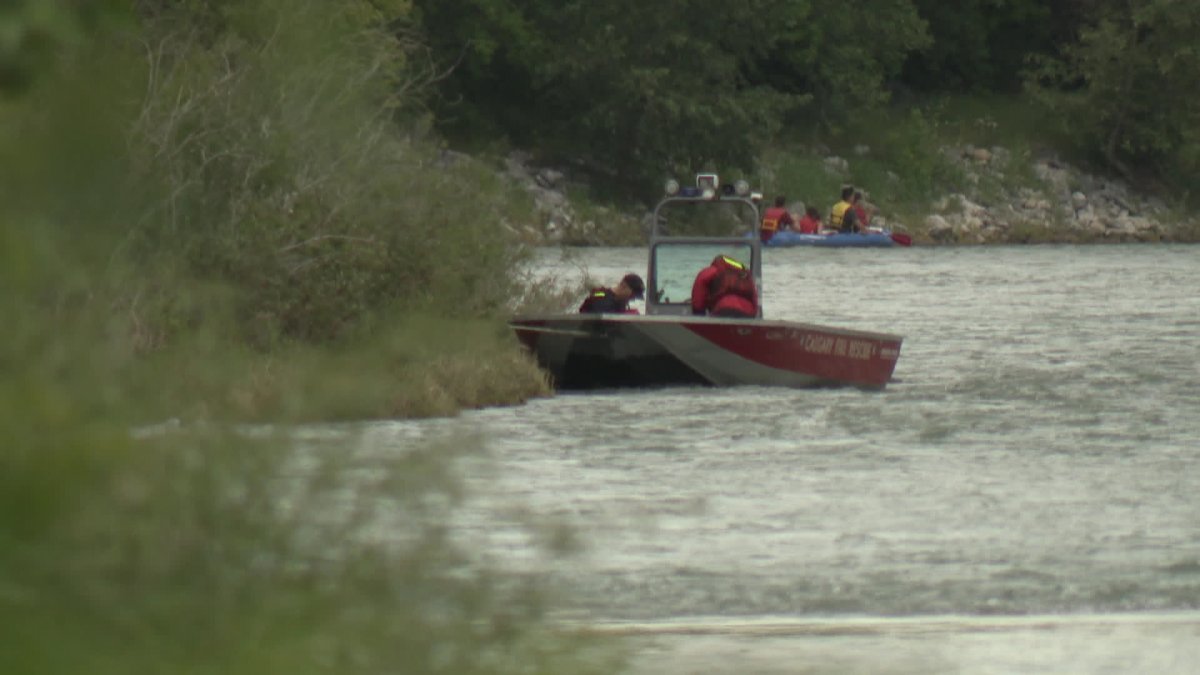 Rescue crews on the Bow River Saturday. 