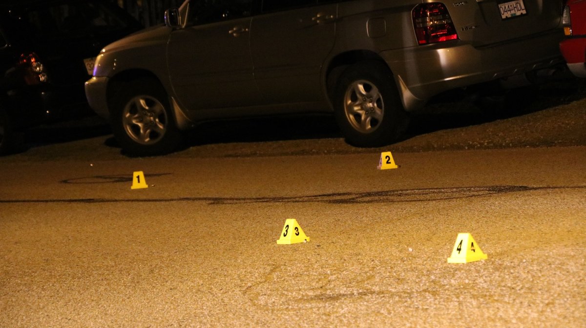 Evidence markers on the street in East Vancouver Tuesday night.