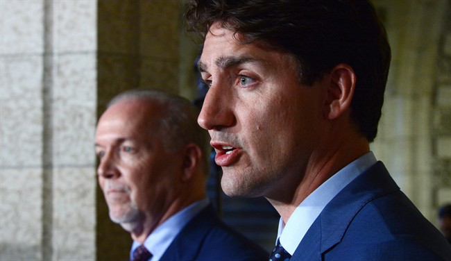 Prime Minister Justin Trudeau holds a press conference with Premier of British Columbia John Horgan following their meeting on Parliament Hill in Ottawa on Tuesday, July 25, 2017.