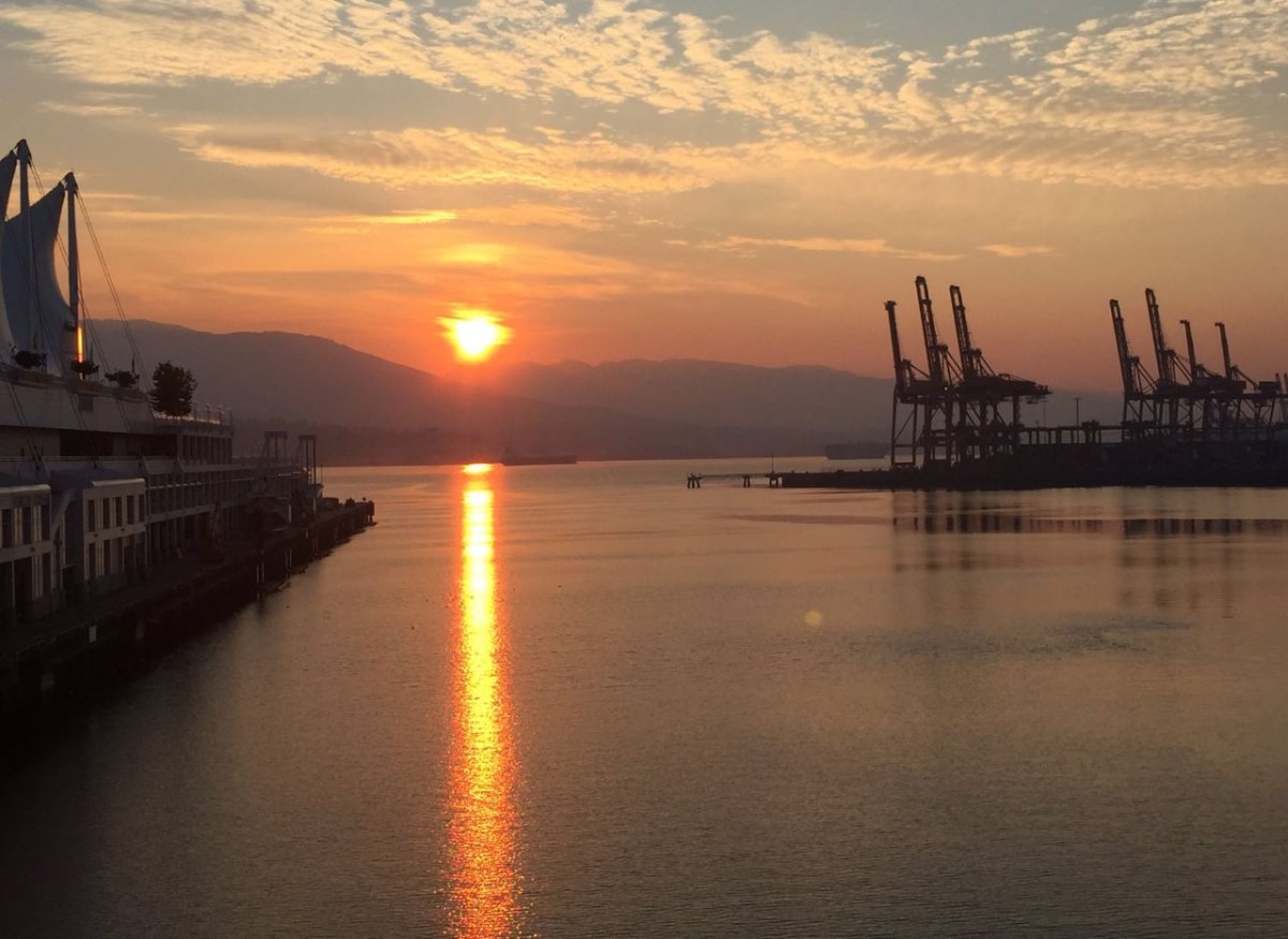 A smokey sunrise over Vancouver on Tuesday.