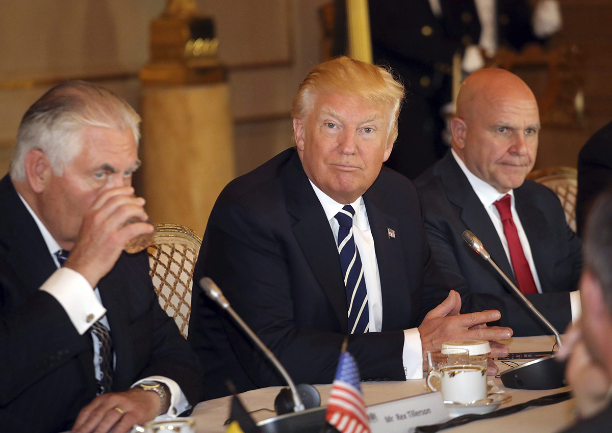 Donald Trump, center, sits with US Secretary of State Rex Tillerson, left, and National Security Adviser H.R. McMaster, prior to a meeting with Belgium's King Philippe and his wife Queen Mathilde at the Royal Palace in Brussels on Wednesday, May 24, 2017.