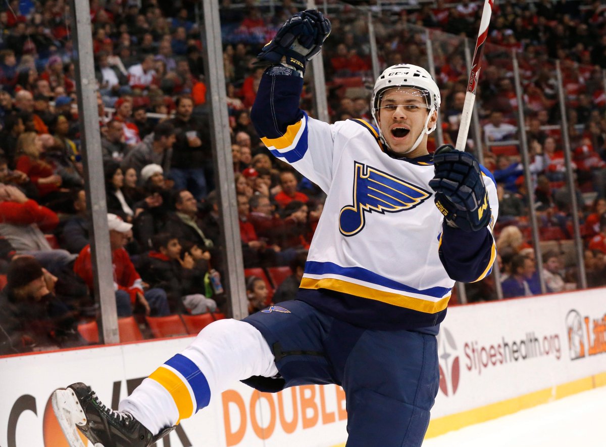 St. Louis Blues right wing Ty Rattie celebrates his goal against the Detroit Red Wings during the first period of an NHL hockey game Wednesday, Jan. 20, 2016 in Detroit.