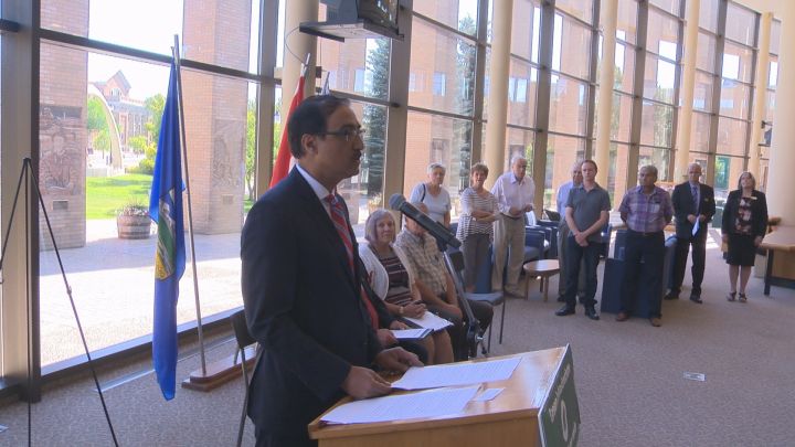 Minister of Infrastructure and Communities Amarjeet Sohi addresses the public at Lethbridge City Hall. 