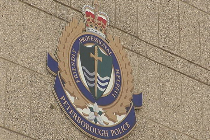 Peterborough police have charged two men following reports of a weapon being seen at a local park during a Victoria Day event.