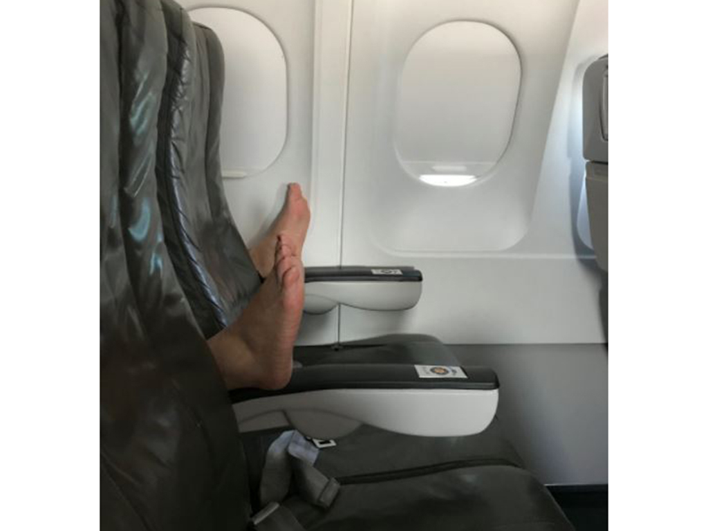 woman airline feet