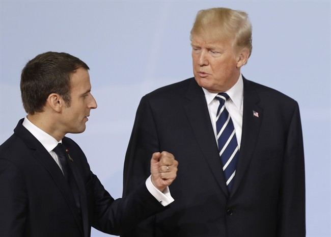 France's President Emmanuel Macron talks with U.S. President Donald Trump on the first day of the G-20 summit in Hamburg, Germany, July 7, 2017.