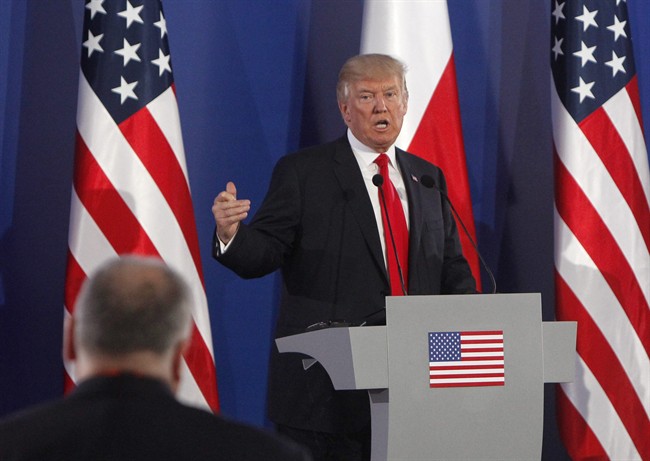 U.S. President Donald Trump gestures while answering a question during a joint press conference with Poland's President Andrzej Duda, in Warsaw, Poland, Thursday.