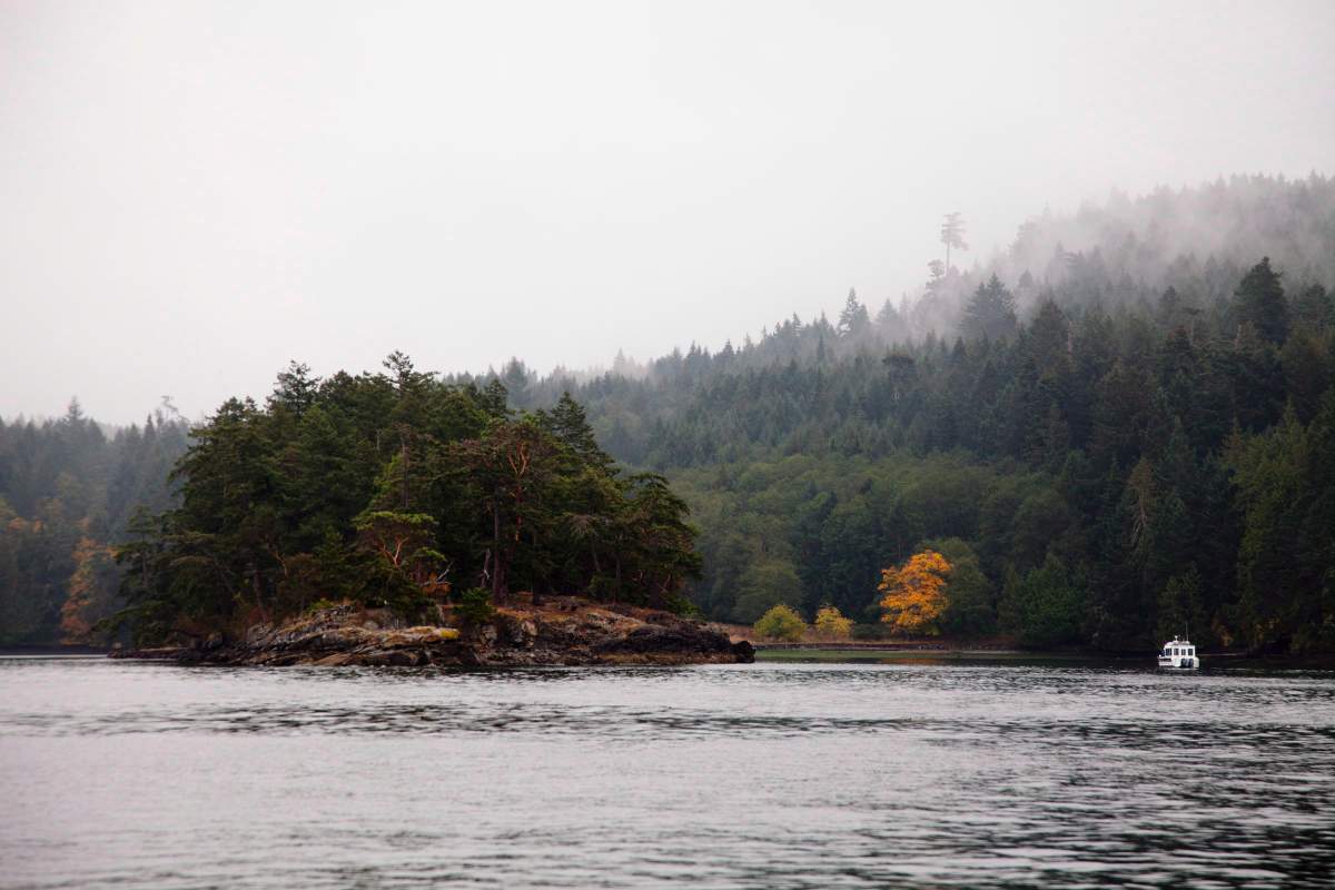 A Parks Canada boat is seen in front of the Roseland Extension on North Pender Island as a part of the Gulf Islands National Park expansion located near Sidney, B.C., on Friday, Oct. 12, 2012.
