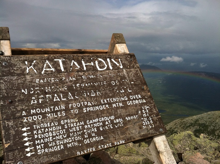 This Aug. 27, 2014 photo shows the weather-worn sign at the peak of Mount Katahdin in Baxter State Park in Maine. Katahdin, the tallest mountain in Maine, is nearly a mile high and is the northern terminus of the Appalachian Trail. 