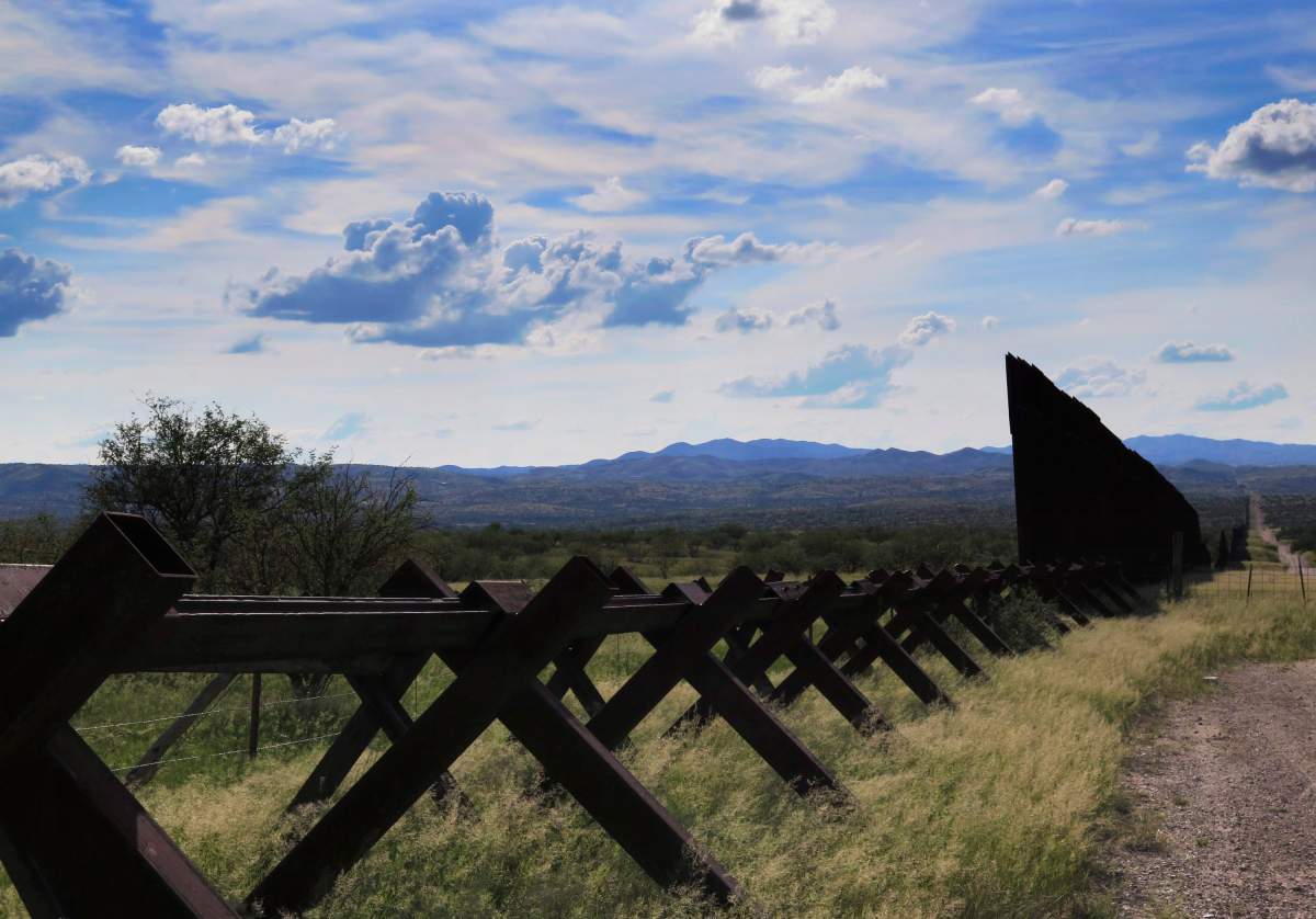 This Tuesday, Sept. 20, 2016, photo, shows the Arizona border with Mexico in Nogales, Ariz. Arizona voters will decided whether to legalize recreational marijuana in November, and law enforcement leaders say legalization will strengthen drug cartels at the border, allowing them to infiltrate the legal pot market and driving them to sell more hard drugs. Advocates of legalization say it will undercut the cartels by eliminating a key segment of their business.