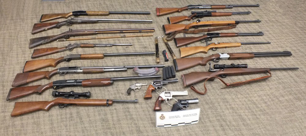 Canadian border agents seized a number of firearms from a family travelling to Alaska.