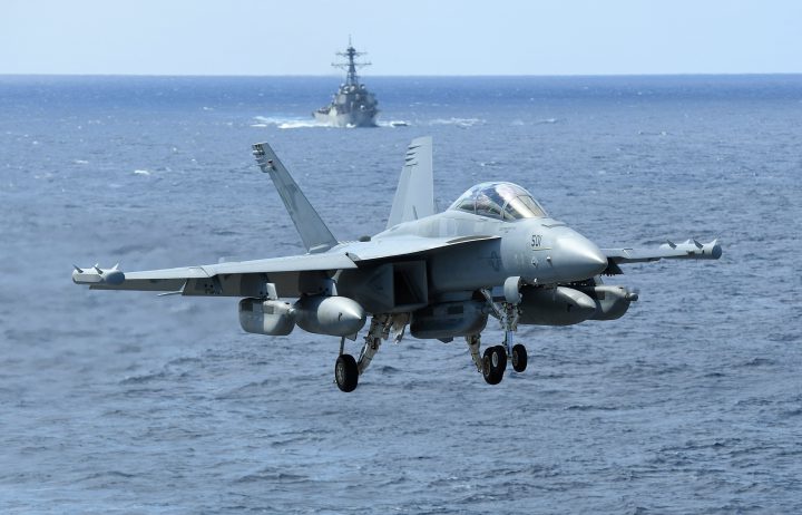 18F Super Hornet approaches to land on-board the USS Ronald Reagan in the Coral Sea, 650 km off the coast from Brisbane, Australia.