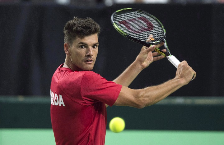 Canada's Frank Dancevic returns to Chile's Christian Garin during Davis Cup tennis World Group playoff singles action in Halifax on Friday, September 16, 2016. Dancevic moved one step closer to a berth in the Rogers Cup main draw, defeating Marius Copil in a Saturday qualifier at Uniprix Stadium. Aug. 5, 2017.