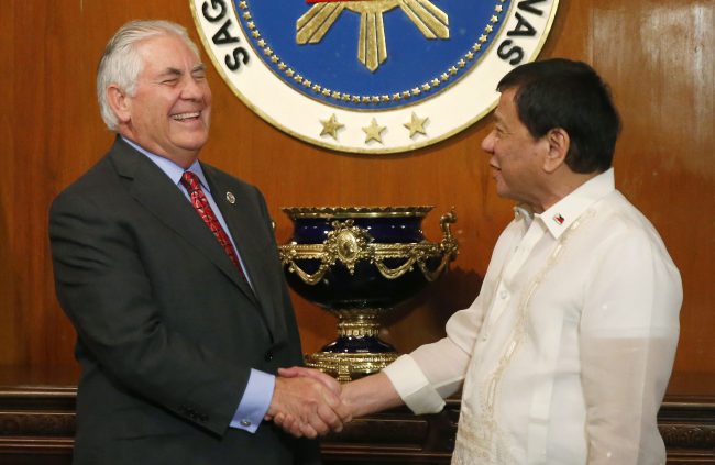U.S. State Secretary Rex Tillerson, left, is welcomed by Philippine President Rodrigo Duterte during the former's courtesy call at Malacanang Palace in Manila, Philippines, Aug. 7, 2017.


