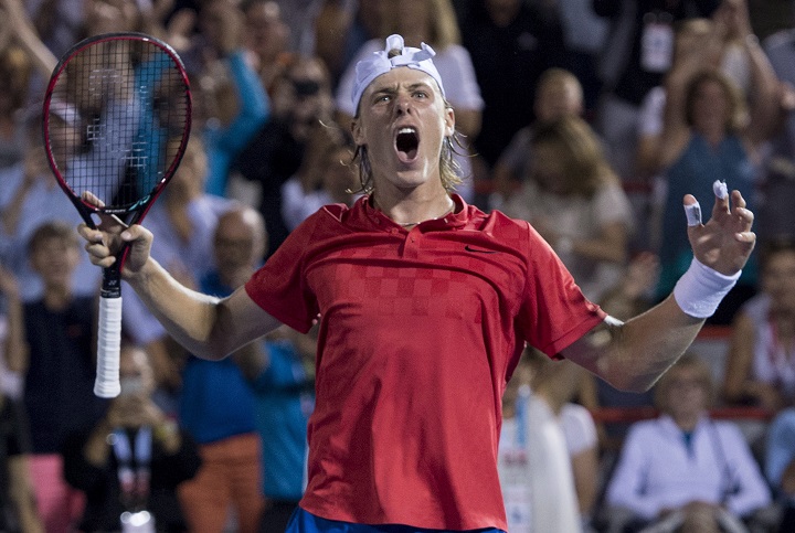 Denis Shapovalov of Canada celebrates after defeating Adrian Mannarino of France during quarter-final play at the Rogers Cup tennis tournament Friday August 11, 2017 in Montreal.