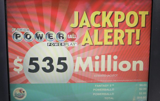 A Powerball Jackpot alert is shown on the screen of a monitor at a gas station, Friday, Aug. 18, 2017, in Hialeah, Fla

.