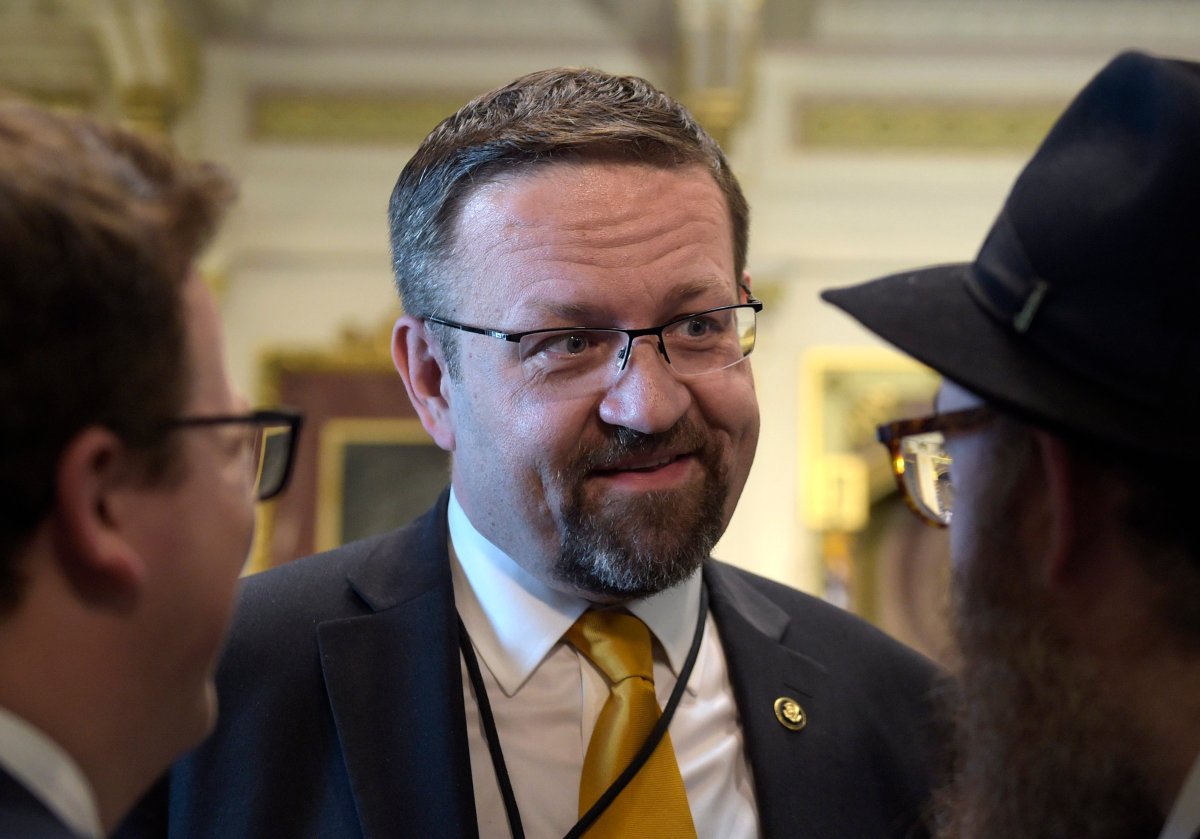 FILE - In this Tuesday, May 2, 2017 file photo, deputy assistant to President Trump, Sebastian Gorka, talks with people in the Treaty Room in the Eisenhower Executive Office Building on the White House complex in Washington during a ceremony commemorating Israeli Independence Day. 