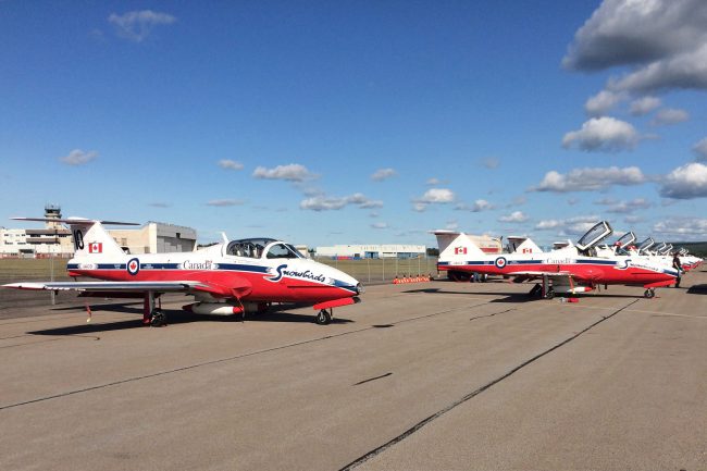 The Snowbirds jets sit parked on the tarmac following a performance at CFB Greenwood in Greenwood, N.S., on Saturday, August 26, 2017.

