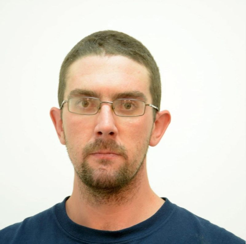 Daniel Loveys, 28, is described as being 5’10” tall with a slim build, brown hair, brown eyes and glasses.
