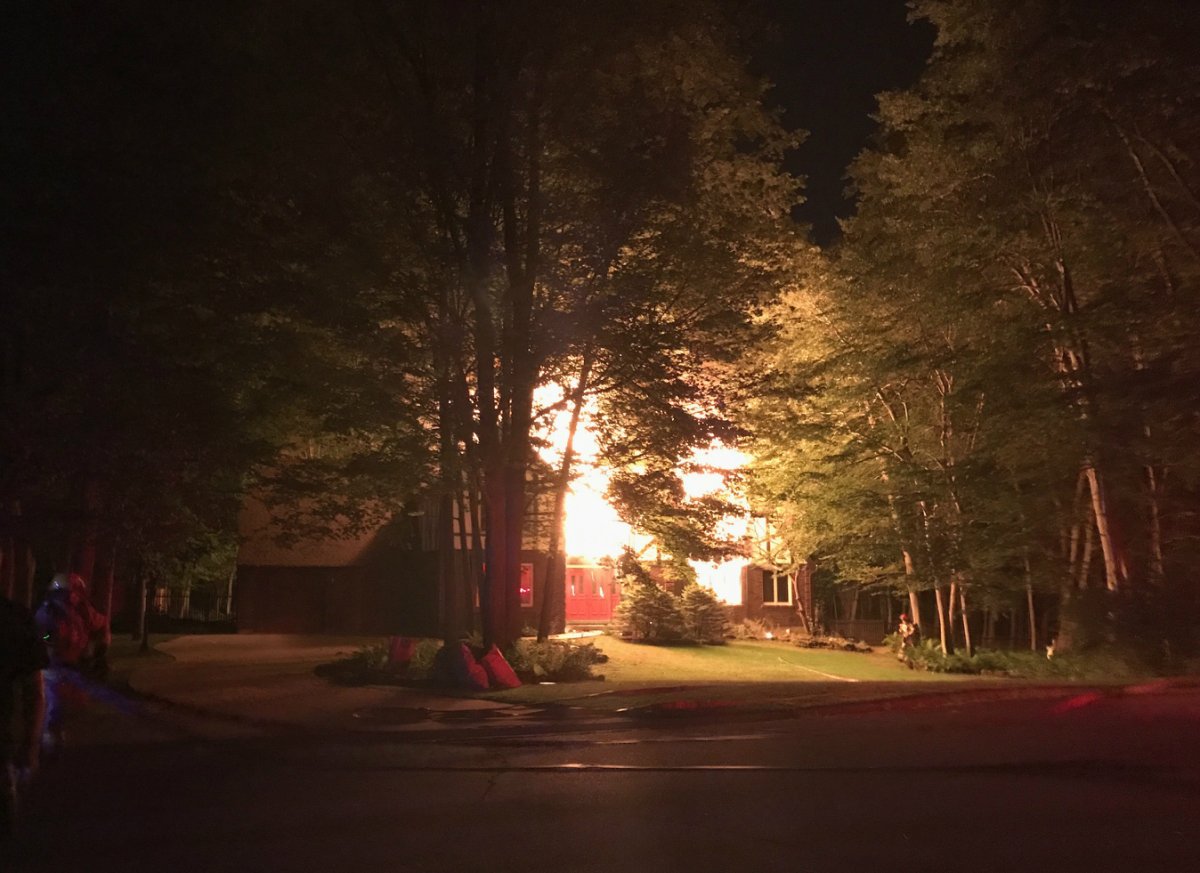 Photograph of the fire submitted to AM980 by a neighbour of the home.