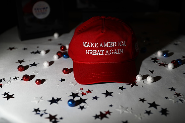 A "Make America Great Again" hat sits on a table ahead of an election night party for 2016 Republican Presidential Nominee Donald Trump at the Hilton Midtown hotel in New York, U.S., on Tuesday, Nov. 8, 2016.