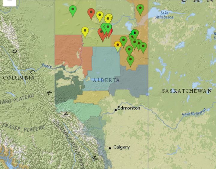 A map of Alberta showing the location of wildfires that were burning in the province as of 3:15 p.m. on Aug. 18, 2017. Red marks indicate "out of control" fires, yellow indicates fires that are "being held" and green indicates fires that are "under control.".